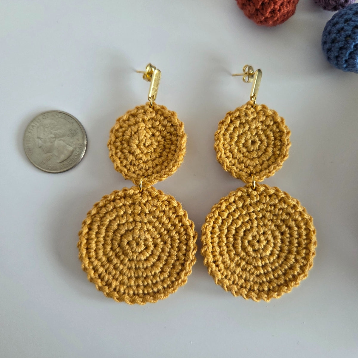 Dangling crochet earring in earth-tone yellow color with gold-plated earring